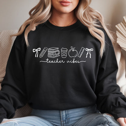 Teacher Vibes design featuring clean white line-art school doodles including bows, a pencil, stacked books, a coffee cup, apple, and ruler arranged above handwritten teacher lettering.