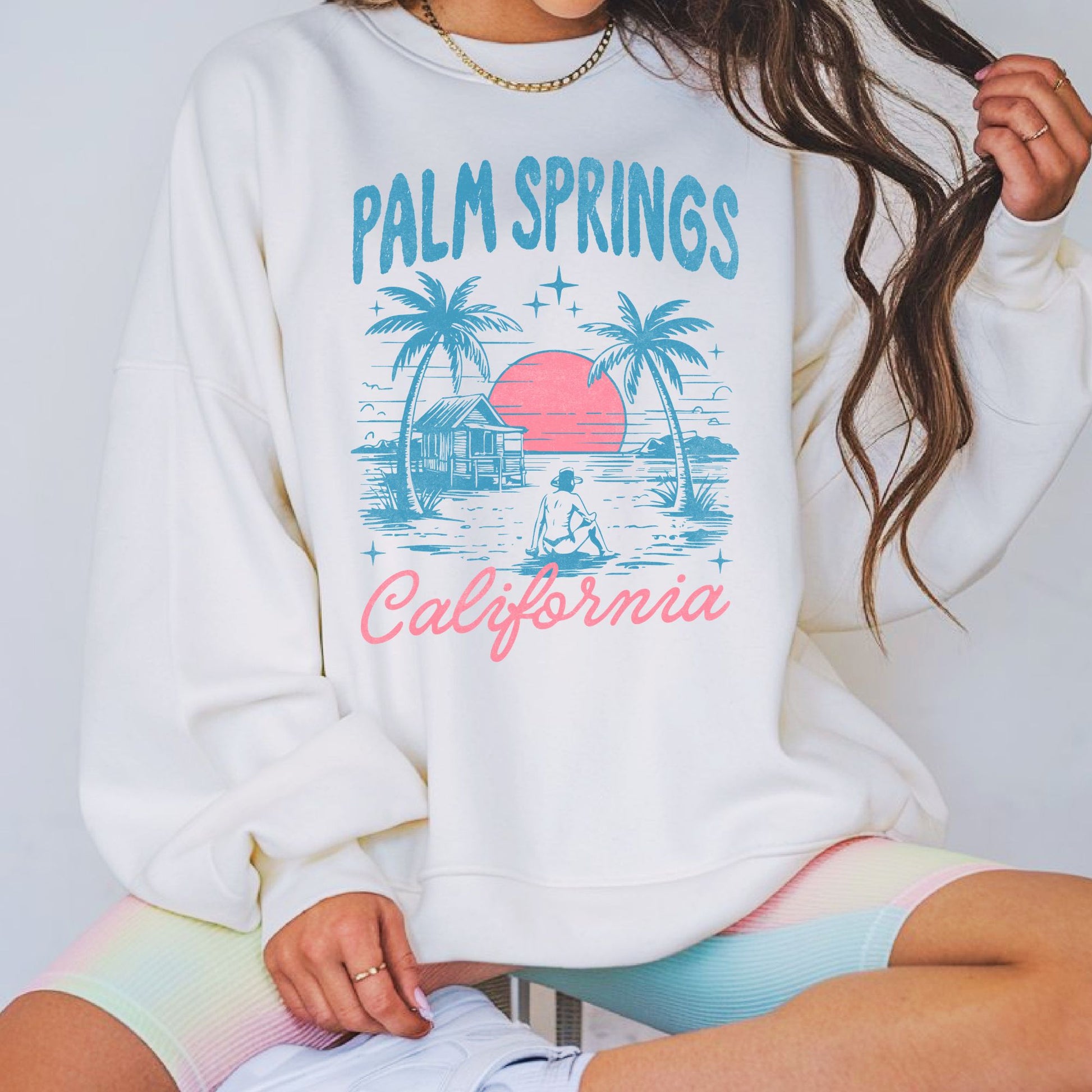 Vintage Palm Springs California graphic featuring retro palm trees, desert sunset, and vacation scenery. Perfect for California travel lovers, desert vacations, summer apparel, and retro graphic tees or hoodies.