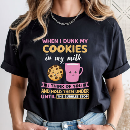Funny sarcastic cookie and milk graphic with the quote "When I Dunk My Cookies in My Milk I Think of You and Hold Them Under Until the Bubbles Stop." Cute humor design for graphic tees, hoodies, and gifts.
