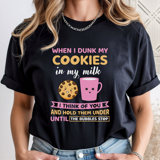 Funny sarcastic cookie and milk graphic with the quote "When I Dunk My Cookies in My Milk I Think of You and Hold Them Under Until the Bubbles Stop." Cute humor design for graphic tees, hoodies, and gifts.

