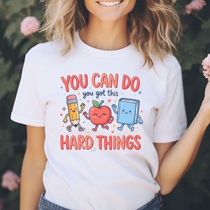 You Can Do Hard Things motivational school design featuring smiling pencil, apple, and book characters with the encouraging phrase You Got This, surrounded by hearts, stars, and colorful classroom accents.